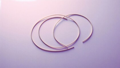 Pale lavender background with two intersecting thin silver lines