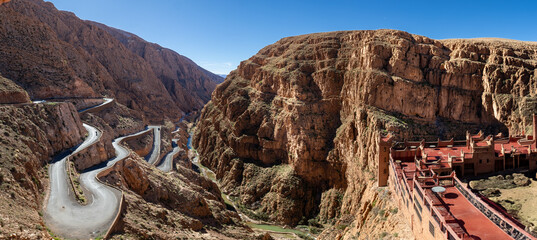 Cliffside terraced hotel, desert landscape. - Oued Dadis