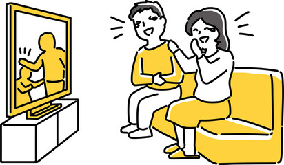 テレビを観て笑うカップル