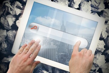 Hands touching search bar on tablet screen © vectorfusionart