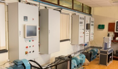 Wall-mounted control cabinet is powering electric motors in flat design equipment room with windows