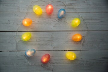 Illuminated lights on wooden planks