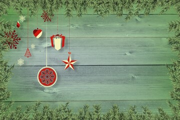 Christmas decorations over wooden planks