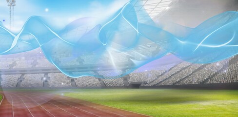 Fototapeta premium Blue trails over playing field