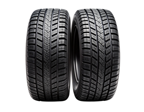 Two Snow Tires Leaning Crosswise with Deep Tread Pattern, Front-Angled View, Transparent Background