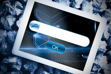 Tablet with search bar on crumpled up paper © vectorfusionart