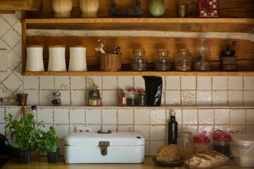 Containers on shelf in kitchen