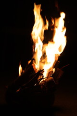 Fire flames on black background. Closeup of fire flames isolated on black background