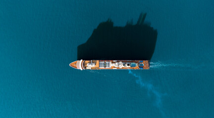 Aerial view of beautiful white cruise ship above luxury cruise in the ocean sea at early in the morning time concept smart tourism travel on holiday take a vacation time on summer