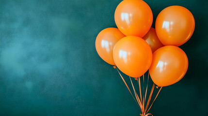 Orange balloons teal background