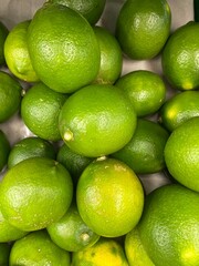 Glossy green limes packed with zing. A citrusy burst of freshness and aroma, perfect for spicing up food and brightening up your day.