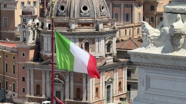 Italian flag flying in the wind in Rome, Italy