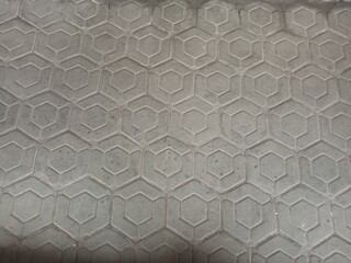 Abstract Grey Hexagonal Concrete Pavement Pattern