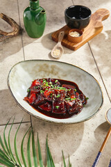 Miso-glazed eggplant with sesame seeds, bright shadows, rustic overhead composition