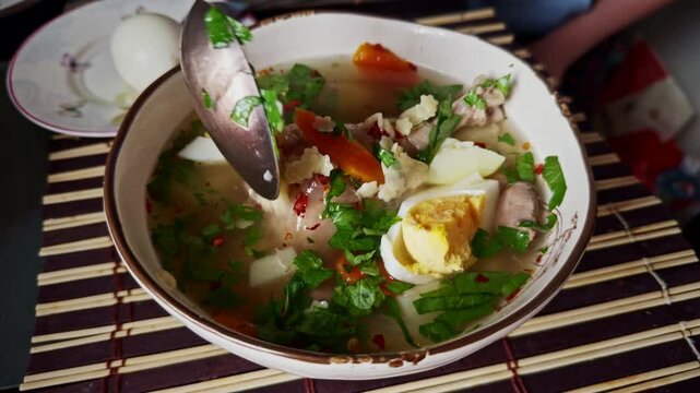 Chicken Soup with Boiled Eggs and  
 Meat and Vegetables