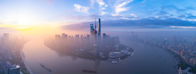 Aerial view of Shanghai skyline in downtown at sunrise.