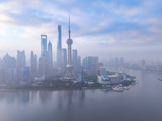 Naklejka premium Aerial view of Shanghai skyline in downtown at sunrise.