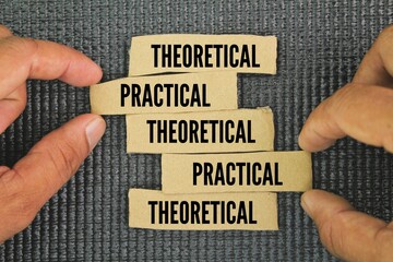 Box paper with the words Theoretical vs Practical. Practical knowledge is gained through your own...