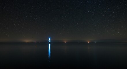 Luminous light post at night