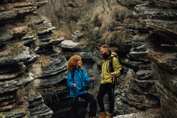 Hikers exploring breathtaking rock formations in nature