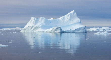 Majestic Antarctic Iceberg Landscape Stunning Glacial Reflection in Calm Ocean Waters