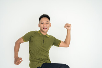 Happy Young Man Celebrating Success with a Joyful Expression