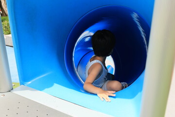 Child on slide.