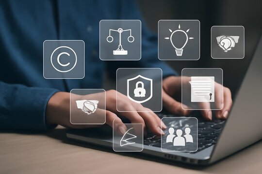 Copyright or patent concept. Professional working on a laptop with digital icons representing intellectual property and digital copyright law. Trademark license, copyleft, Rights symbol, Piracy crime
