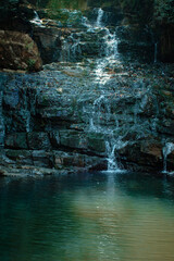 Naklejka premium waterfall and rocks