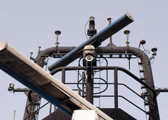 A mast of the offshore support vessel with all the communication antennas, gps, dgps, radio and radar antennas. Also the security CCTV camera is in place to overview ship main deck 24/7