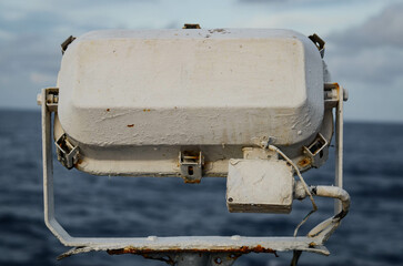 A flood light on board of the offshore support vessel. Serves to provide illumination on deck for...