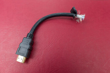 Cut hdmi cabel on ared background