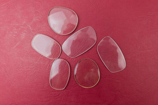 Dioptric lenses from glasses on a red