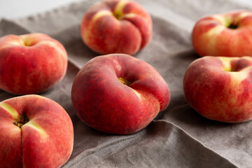 Fresh juicy ripe fig peaches, side view.