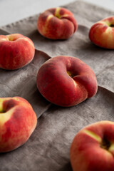 Fresh juicy ripe fig peaches, side view.