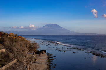 Mount Agung Visible Across Low Tide Shoreline from Nusa Penida Island