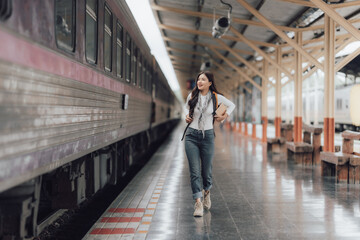 Woman Traveler at Train Station Platform