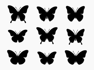Collection of Nine Butterfly Silhouettes in a Grid Pattern on White Background