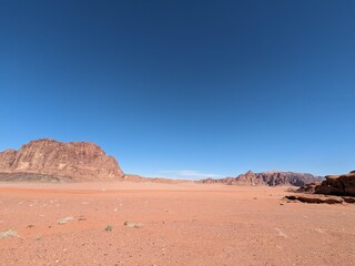 Orange color sand texture pattern background. Wadi Rum desert, Jordan,Arabia scenic beautiful panorama,Close-up of redorange sand on desert