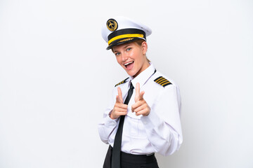 Airplane caucasian pilot woman isolated on white background pointing to the front and smiling