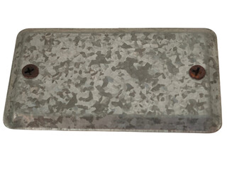 A rectangular, weathered metal plate with two rusty screws on opposite ends.