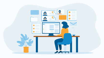 Woman working at computer with virtual team and online collaboration tools in a modern office
