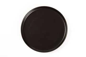 Empty black circle ceramics plate isolated on white background,top view.