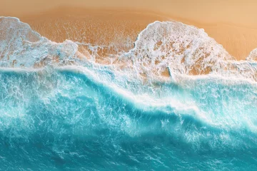 Selbstklebende Fototapeten Aerial view of turquoise ocean waves breaking on a golden sand beach © Abd