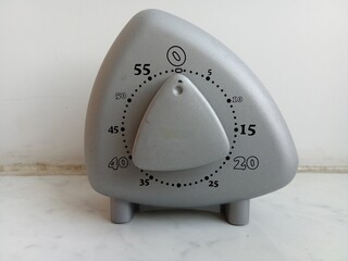 Metal timer  for kitchen isolated on white.