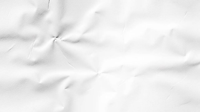 Crumpled white texture background of a wrinkled paper surface showcasing subtle creases and abstract light and shadow play.