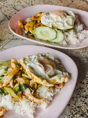 Khan Pad Ka Prao Ta Lay or Thai Rice and Stir-Fried Seafood with basil.