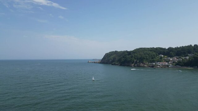 Babbacombe, South Devon, England: DRONE VIEWS: Flying across Babbacombe Bay towards Long Quarry Point, the coastline and various motor boats. South Devon is a popular UK holiday destination.