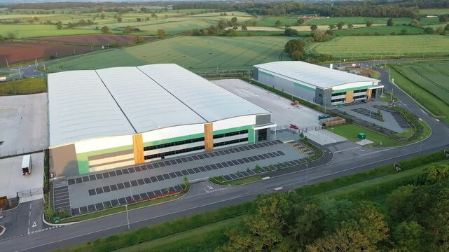 Commercial warehouse and logistics centre located in a large industrial business park and trading estate, featuring distribution hubs, modern warehouses, industrial units and supply chain operations