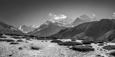 Thorung Khola gorge against snowy Gangapurna and Annapurna III peaks. Himalaya mountains, Nepal.